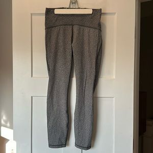 Lululemon 3/4 length leopard print leggings with black mesh accents! Size 8